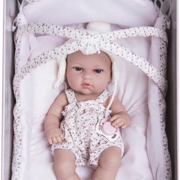 Bebé natal lila con cuna